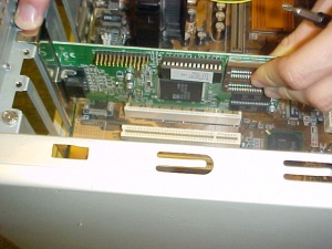 A card being put into a motherboard